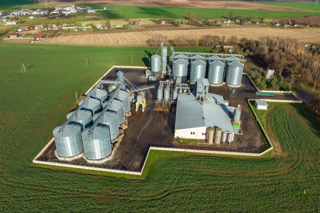 aerial view of a huge agro-industrial complex with silos and grain drying line